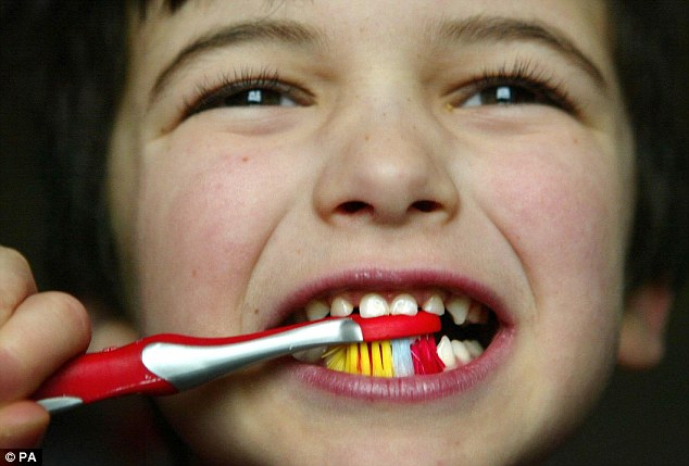 Prevention: Dentists recommend children brush their teeth twice daily with a toothpaste containing fluoride