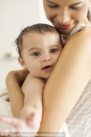 Carry your newborn in a sling so that he/she can sleep nestled against you while you get on with errands, says Nicola